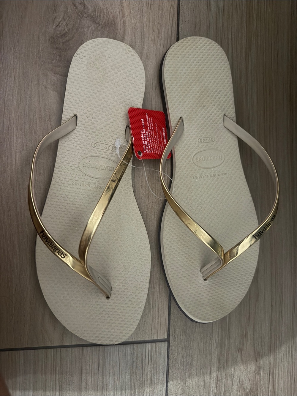 Havaianas Slim Flip Flops in Beige with Gold Straps